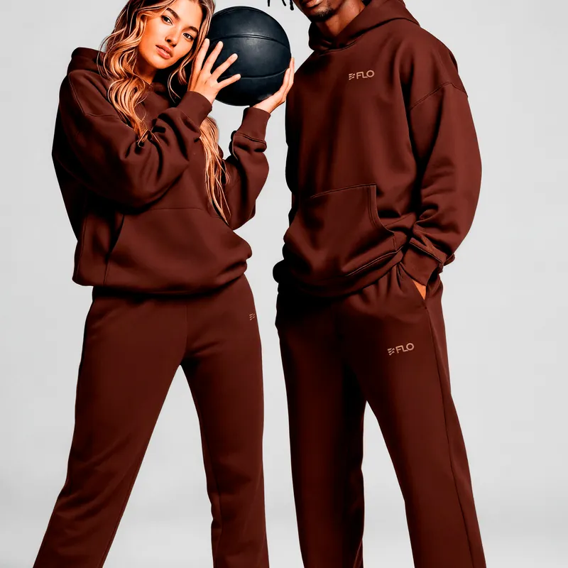 Couple wearing the Presence hoodie and sweatpants